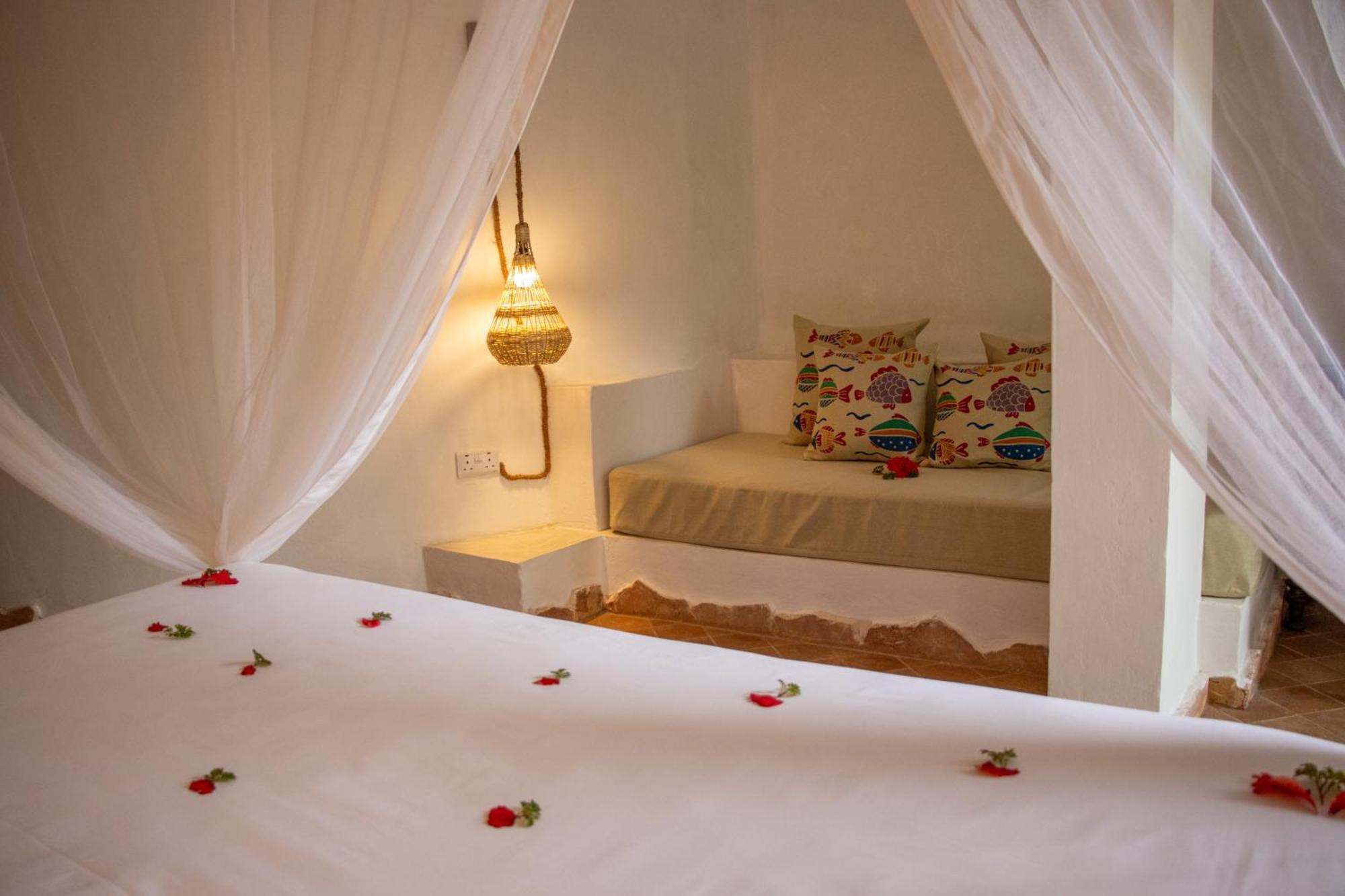 Mvuvi Boutique Resort Kiwengwa  Δωμάτιο φωτογραφία